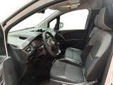 the interior of a car with two seats and a steering wheel