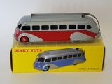 a toy bus that is sitting on top of a box