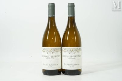 two bottles of wine sitting next to each other on a table