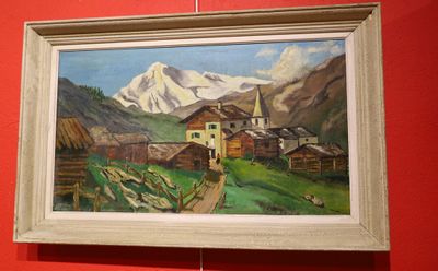 a painting hanging on the wall of a red room