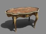 a small table with a marble top on a gray surface