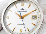 a close up of a wrist watch with a white dial
