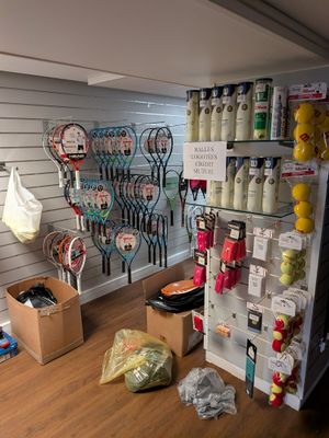 a room with a lot of items on the shelves