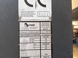 an image of a machine with a label on it in a factory