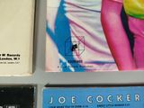 three books that are on the table together