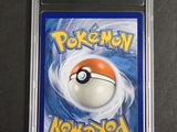 a close up of a pokemon card on a table