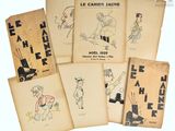 six livres illustrés de personnages, posés sur une table
