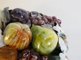 a close up of a bowl of fruit and vegetables