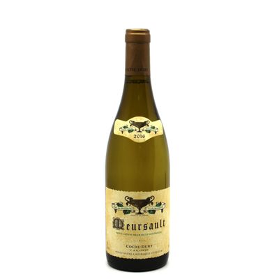 a bottle of wine that is sitting on a table
