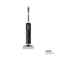 une image représentant une photo en noir et blanc d'un aspirateur sans fil