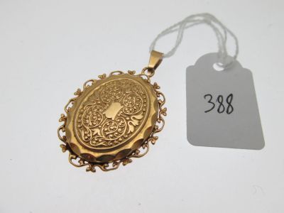 a close up of a gold locke with a price tag on it