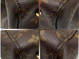 a close up of a brown louis vuitton bag with gold hardware