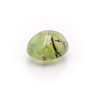 green tourmaline gemstone on a white background