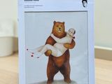 a box with a picture of a bear holding a woman