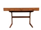 a wooden desk with two drawers on top of it