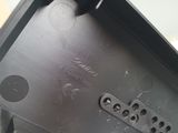 a metal object with holes in it on a table