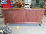 an image of a wooden cabinet in a store