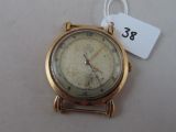 a gold wrist watch with a price tag attached to it