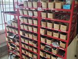 a large rack with lots of boxes on top of it