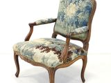 an image of a chair with a floral upholstered back