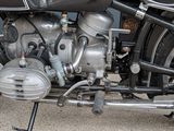 a close up of a motorcycle parked on the side of the road