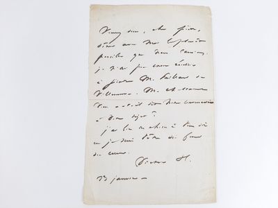 a letter written in black ink on a piece of paper