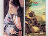 two books on a white surface with a painting of a woman and a man