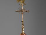 an old copper weather vane with a bird on top of it