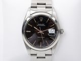 an image of a wrist watch with a black dial on a silver bracelet
