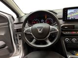 the interior of a car with a steering wheel, dashboard, and dash board