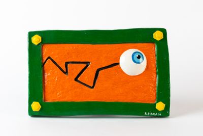 une image orange et verte sur laquelle figure un œil