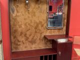 an image of a room with a mirror and a cabinet