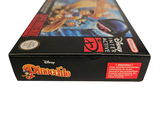 a box with a game inside of it on a white surface