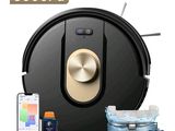 a close up of a robot vacuum cleaner with a remote control