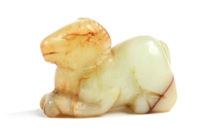 CHINE Groupe en jade nuancé de rouille représentant un bélie…