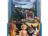 une vitrine Playmobil avec la photo d'une petite fille et d'un chien