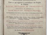 un livre ouvert avec l'image d'un oiseau dessus