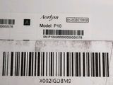 the back of a laptop computer with a bar code on it