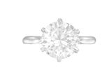 gros plan d'une bague en diamant sur fond blanc