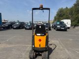 an image of a forklift truck parked in a parking lot