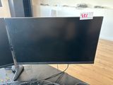 a computer monitor sitting on top of a desk next to a keyboard and mouse