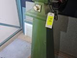 a machine that is sitting on a stand in a room