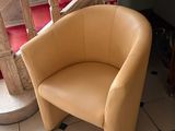a chair that is sitting in front of a staircase