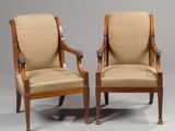 pair of mahogany armchairs with upholstered upholstered arms