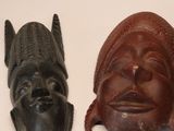 three different types of masks on a white surface