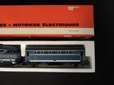 an image of a blue and white train sitting on top of a box