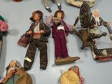 many figurines that are on the wall of a room