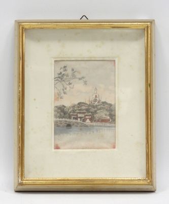 an old picture of a picture of a building in a gold frame