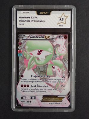 a close up of a pokemon card in a plastic case