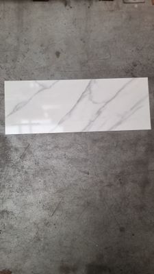 a close up of a piece of marble sitting on top of a table